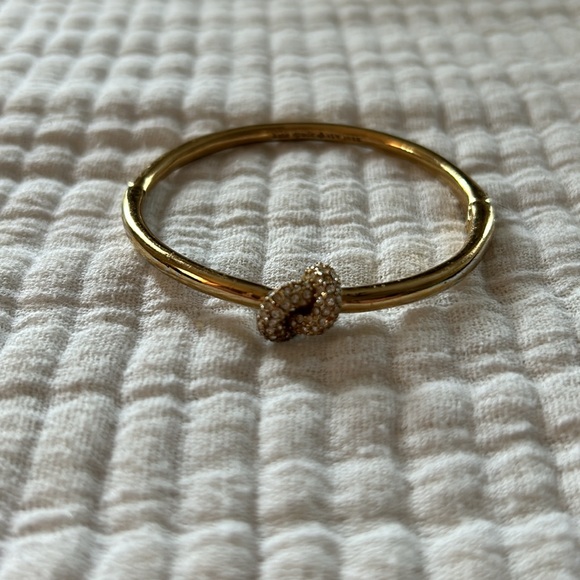 Gold Kate Spade bracelet with rhinestone knot design - Picture 4 of 5